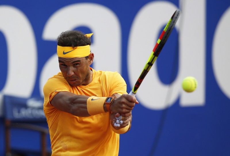 球王納達爾完成背靠背紅土「雙11冠」的空前紀錄。（美聯社）