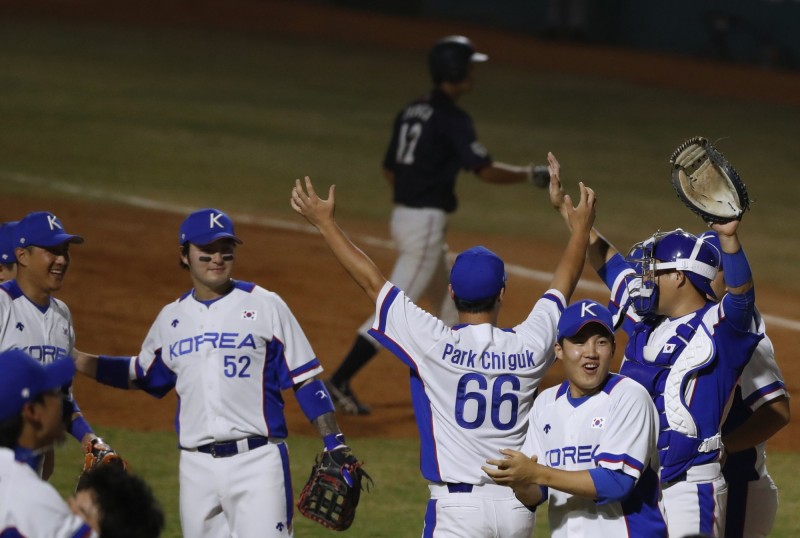 韓國拿下本屆奧運棒球金牌，陣中球員兵役解套。（路透）