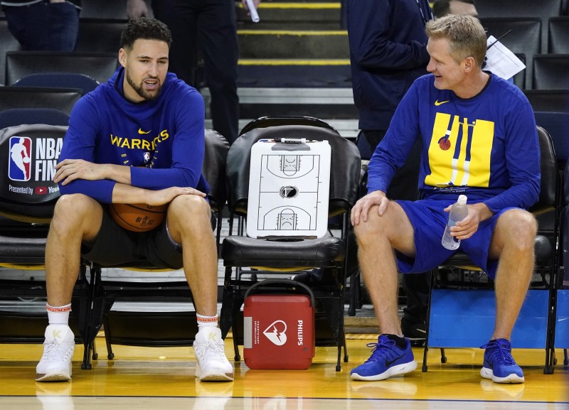 （左起）K.湯普森與柯爾。（歐新社）