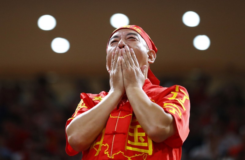 中國在預賽遭淘汰，球迷十分痛心。（路透）
