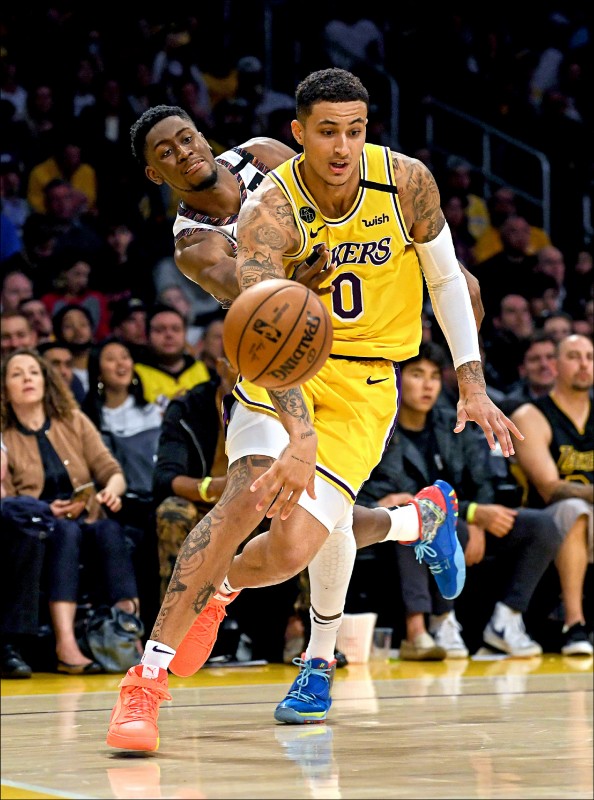 湖人球星庫茲馬（前）坦言，沒有觀眾觀看比賽，感覺很奇特。（法新社檔案照）