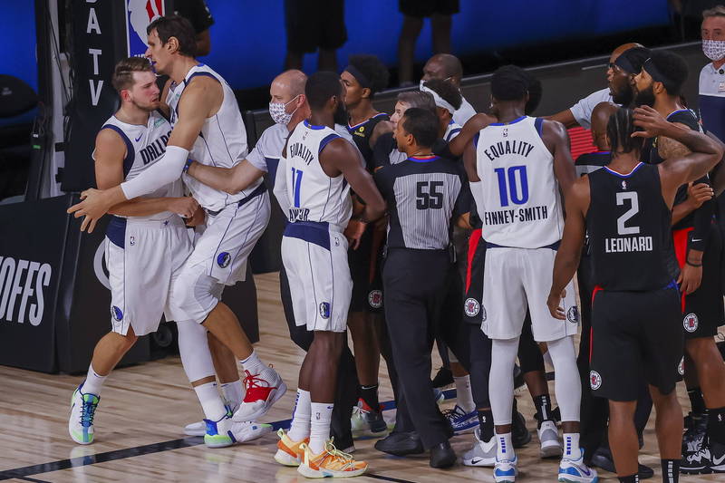 東契奇和小莫里斯都遭聯盟罰款。（資料照，歐新社）