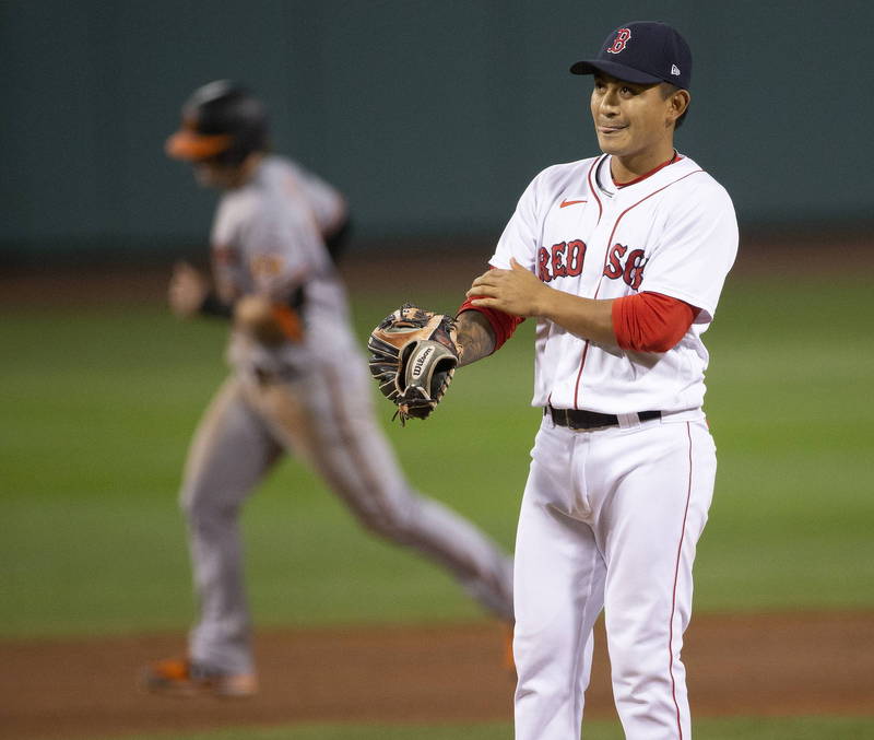 林子偉生涯首度登板首球就挨轟。（法新社）