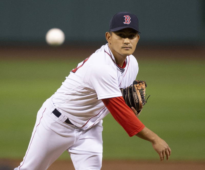 林子偉生涯首度登板投球。（法新社）