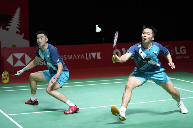 麟洋配逆轉勝，世錦賽連兩屆晉級16強。（資料照，美聯社）