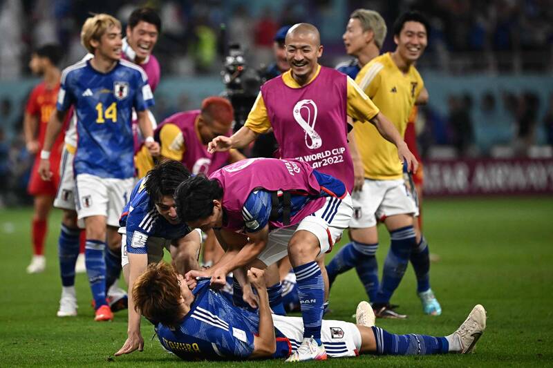 日本隊挺進16強。（法新社）