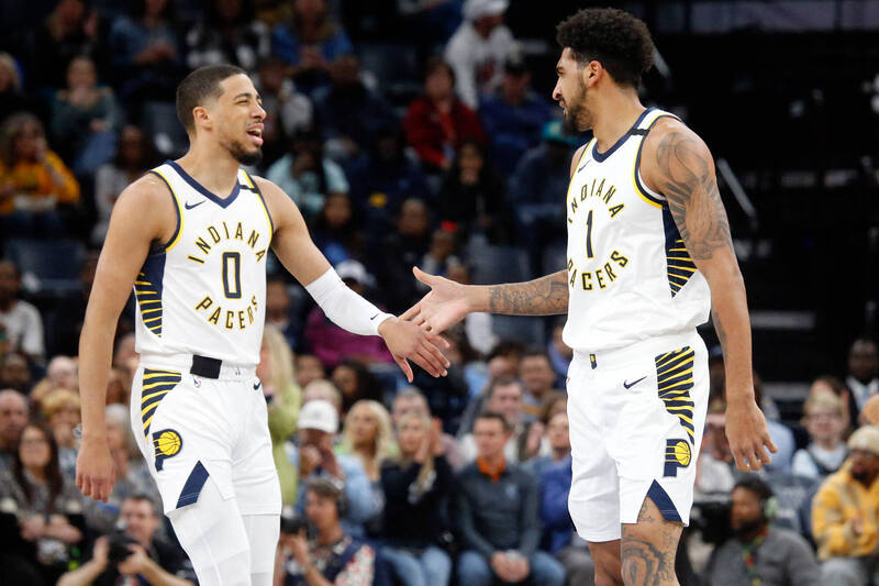 哈里伯頓和托平。（今日美國）