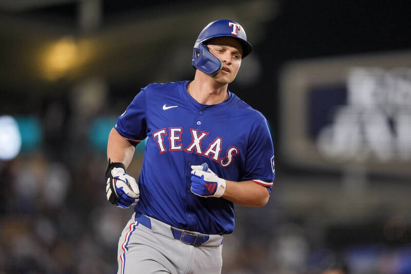 遊騎兵球星席格敲逆轉三分砲。（美聯社）