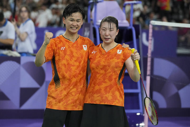 日本組合東野有紗（左）/渡邊勇大（右）。（美聯社）