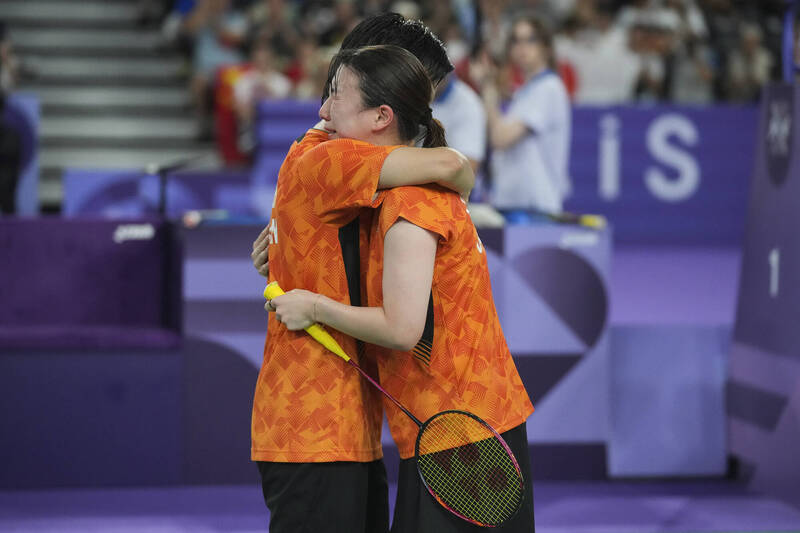 日本組合東野有紗（左）/渡邊勇大（右）。（美聯社）