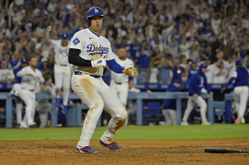 大谷翔平跑回再見分。（路透）