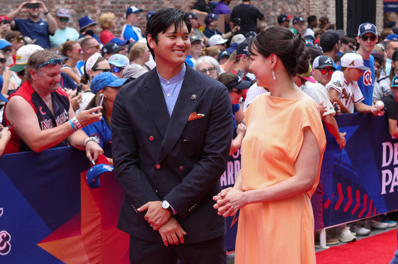 大谷翔平與愛妻田中真美子。（路透）