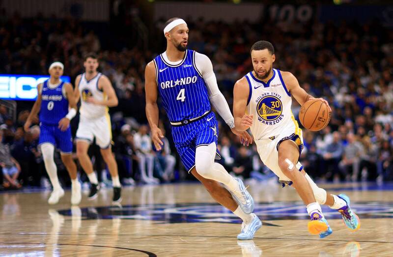 柯瑞（右）。（法新社）