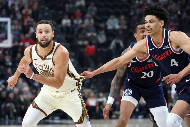 柯瑞（左）。（法新社）