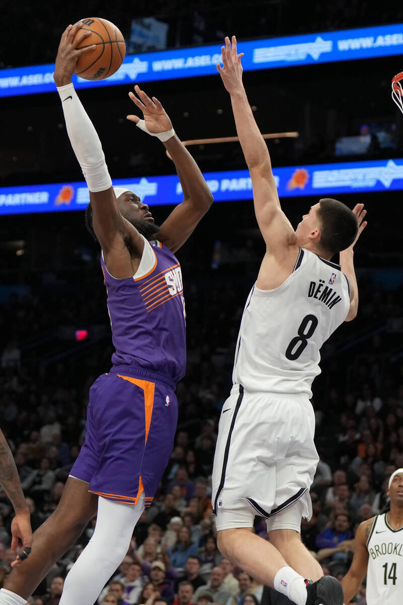 威廉斯（左）狂轟27分助隊取勝。（美聯社）