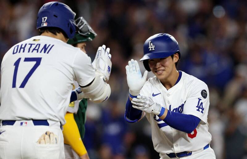 大谷翔平、金慧成。（路透）