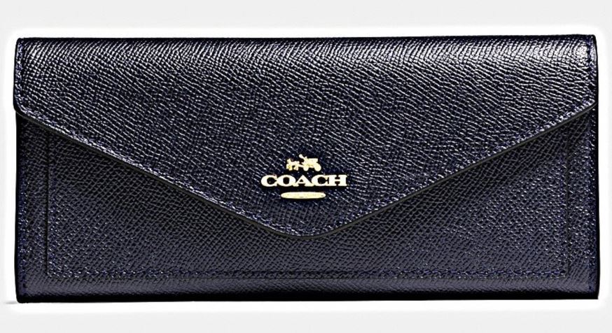 Coach信封式長夾／7,500元。