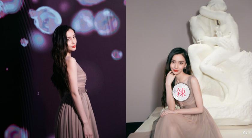 Angelababy 出席品牌活動，一個彎腰讓美胸呼之欲出（翻攝自Angelababy WEIBO，以下同）