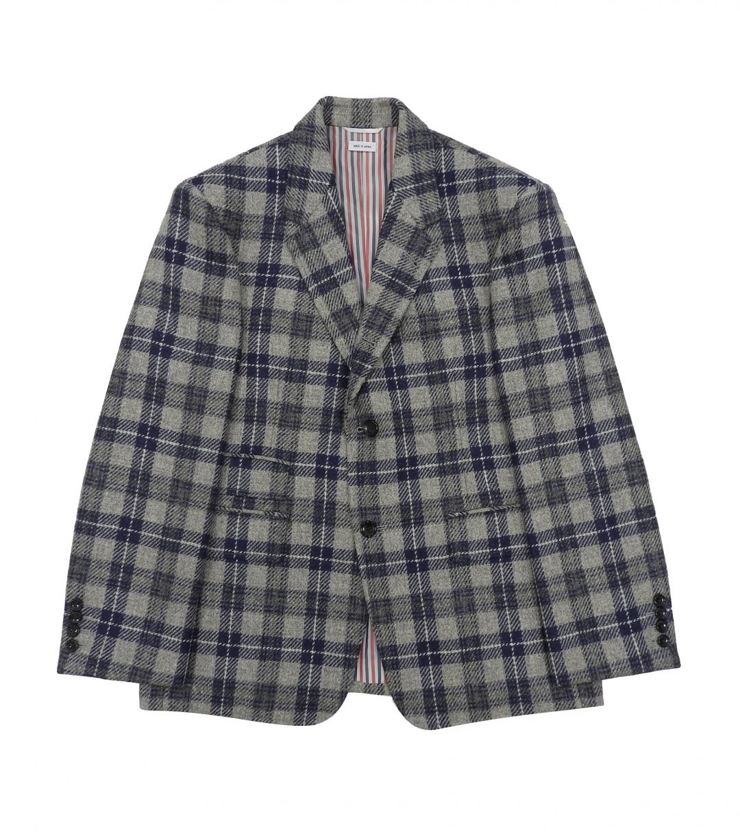 THOM BROWNE Tartan 格紋羊毛西裝外套，77,900元。(THOM BROWNE提供)