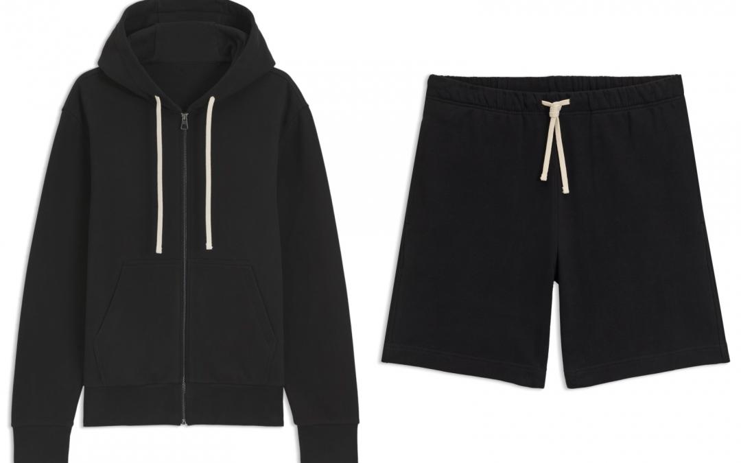 （左起）黑色運動外套（NT$13,400）、黑色運動短褲（NT$8,900）。