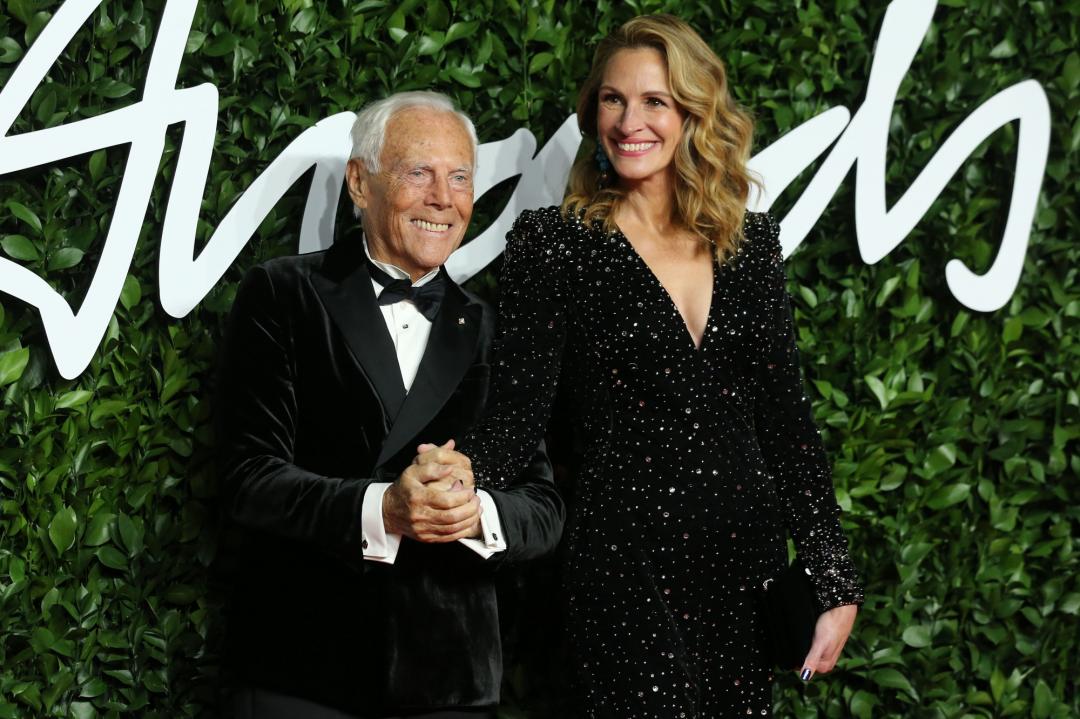 茱莉亞羅勃茲和喬治亞曼尼先生有多年情誼。（法新社）