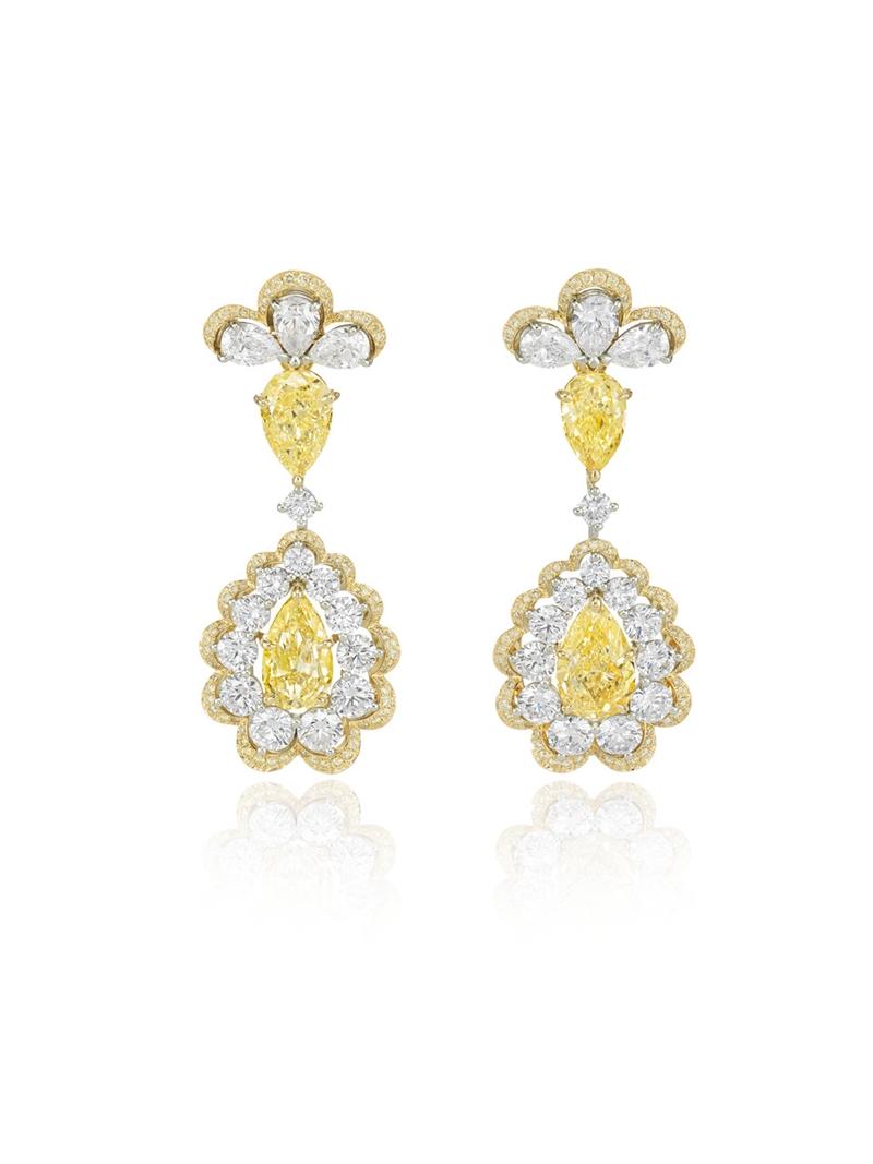 Precious Lace系列耳環,鑲嵌4.16克拉梨形黃鑽及3.80克拉鑽石。(Chopard提供)