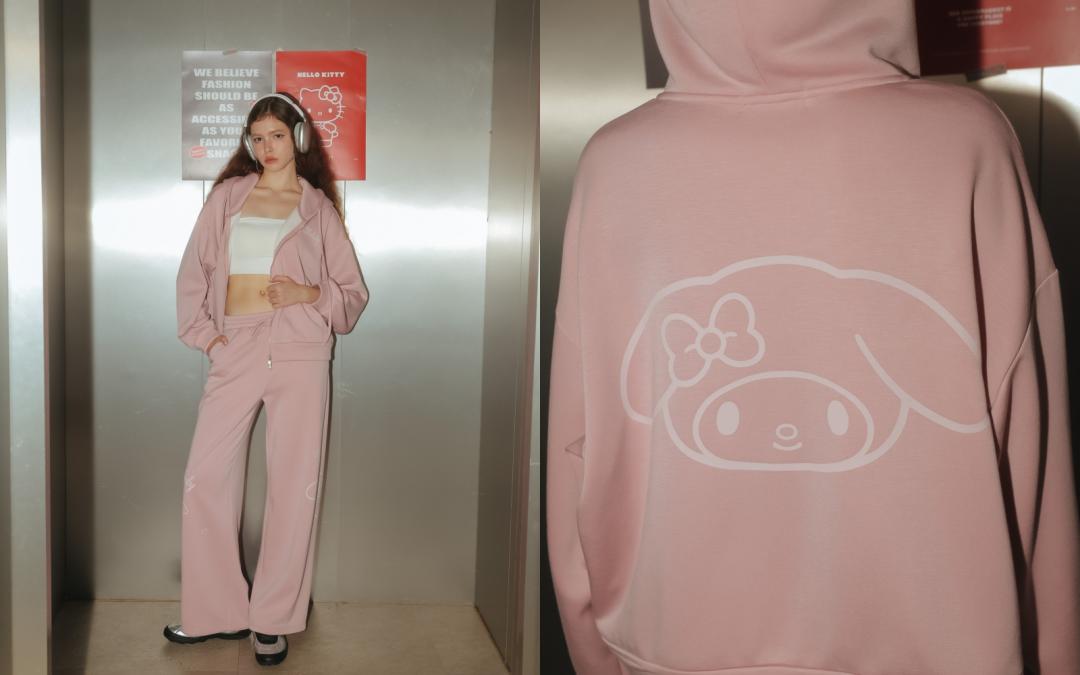 美樂蒂圖騰的美背印花圖案拉鍊外套（NT$1,480）搭配印花圖案抽繩鬆緊休閒長褲（NT$1,280）。