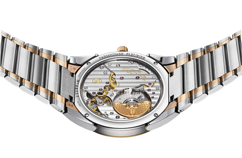 22K玫瑰金微型自動盤，上頭清晰的大麥粒機刻紋理展現帕瑪強尼的精湛藝術工藝。（Parmigiani Fleurier提供）