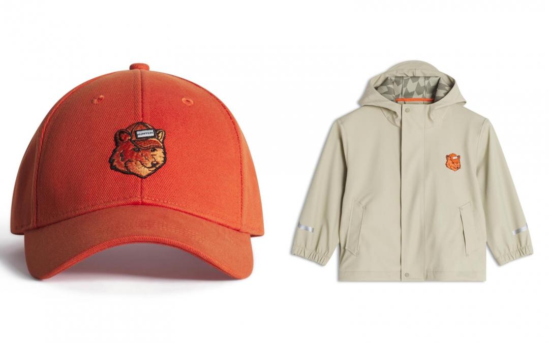 MAISON KITSUNÉＸHUNTER聯名系列（左起）焦糖橘狐狸頭棒球帽（NT$3,600）；巖沙米狐狸頭防水外套（NT$5,000）。