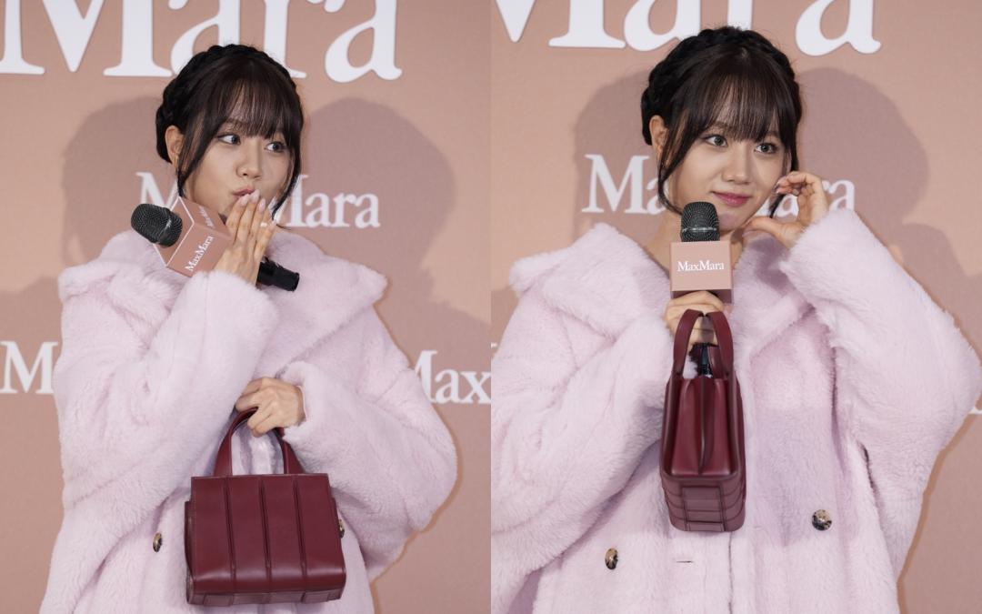 惠利以粉色大衣展現甜美可愛。（圖／記者潘少棠攝）