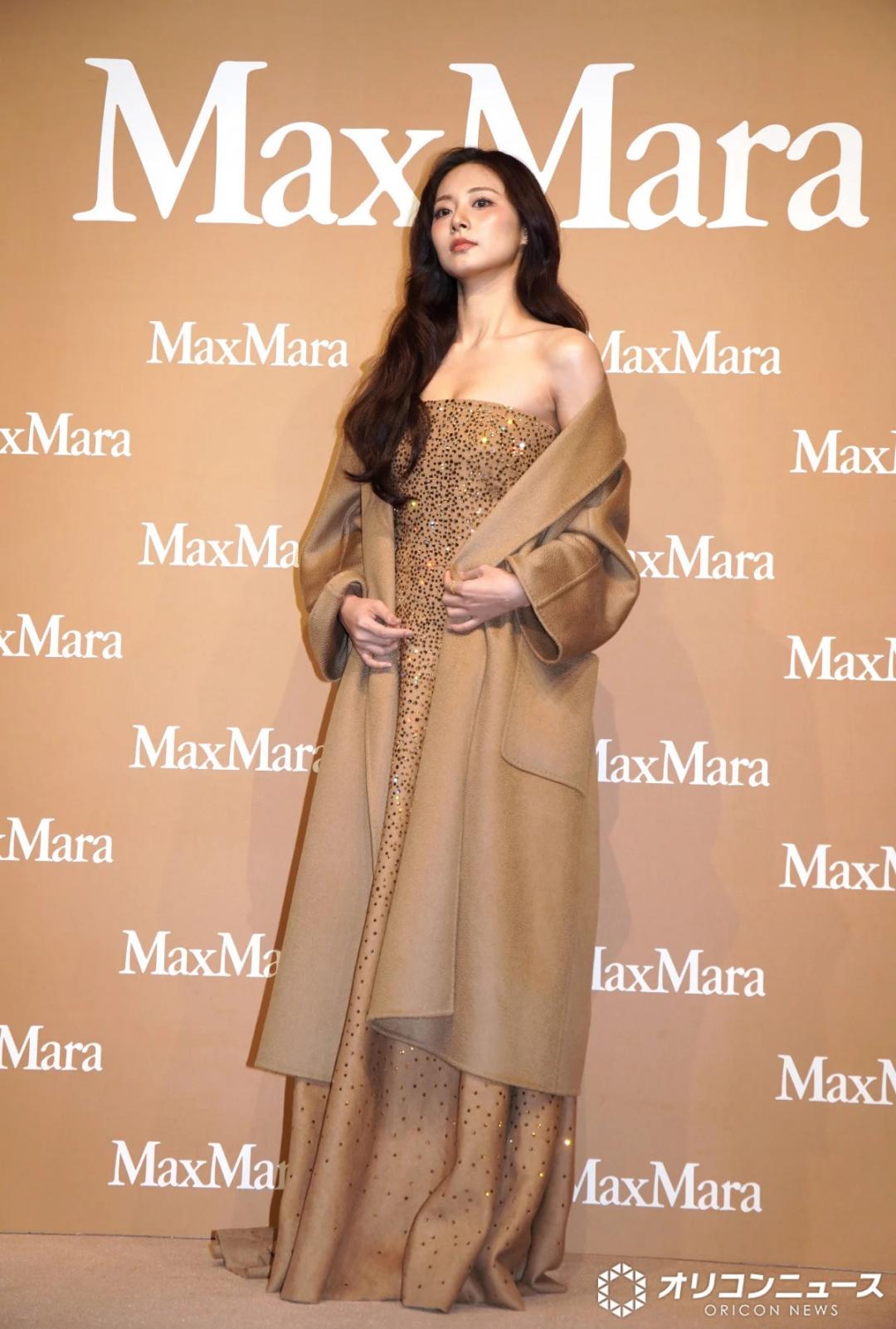 作為跨海出席的重量級嘉賓，子瑜以水鑽平口禮服搭配經典駝色大衣，勾勒雋永的低調奢華風格。