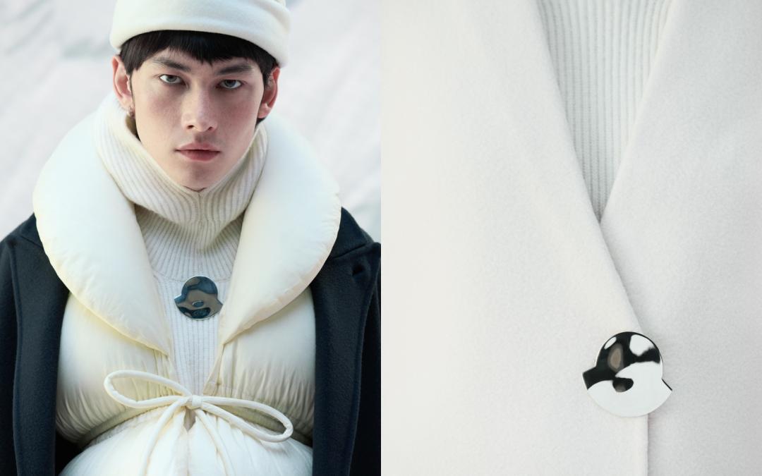 金屬圓弧型點綴，成為MONCLER簽名式註腳。