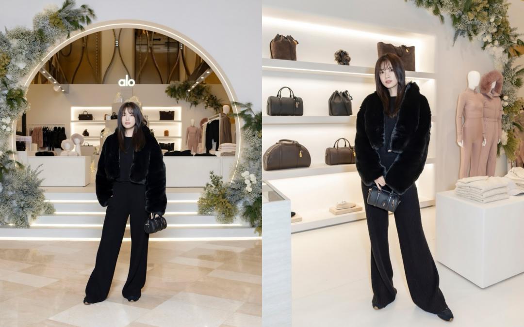 韓孝周選穿成套黑色造型，以率性氣場平衡過於童顏的臉蛋。