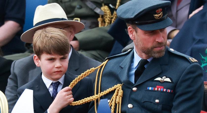 威廉王子與小兒子路易王子。(路透)