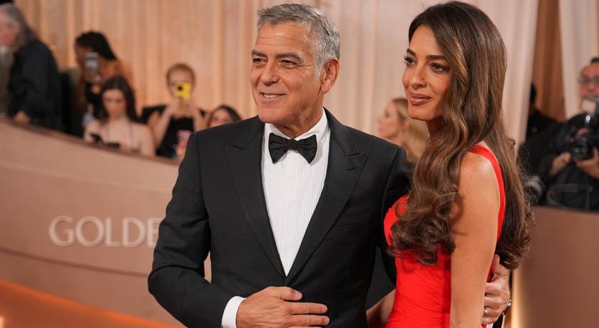 喬治克隆尼與老婆艾瑪一同出席金球獎。(美聯社)