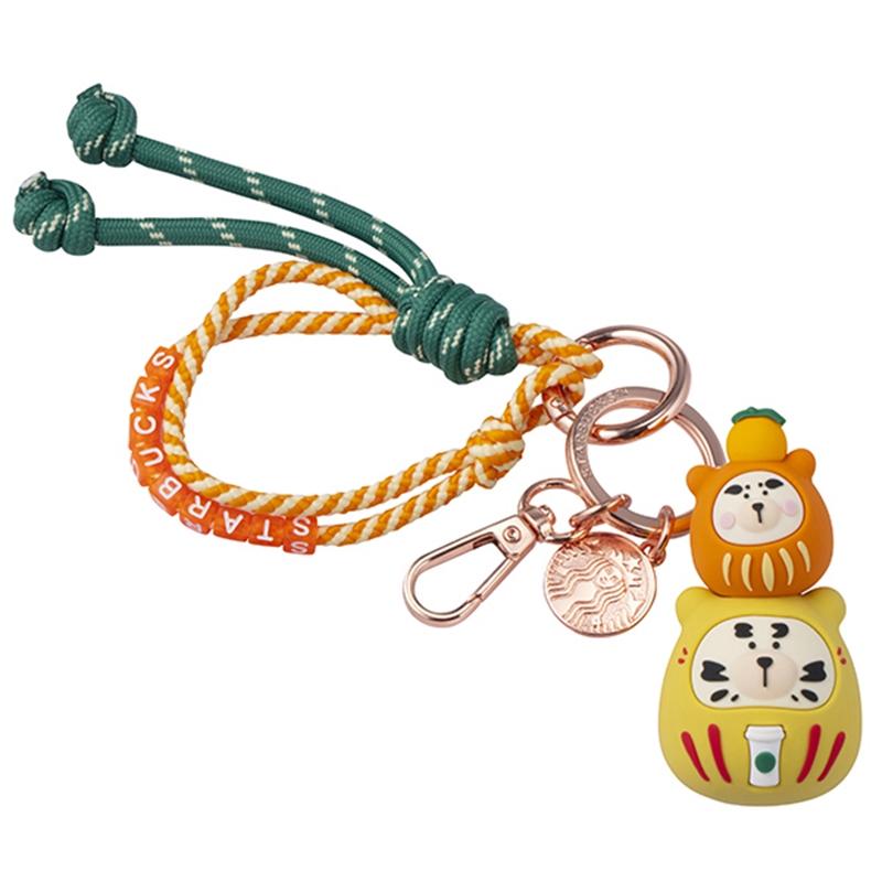 吉利達摩小熊鑰匙圈，600元。（Starbucks提供）