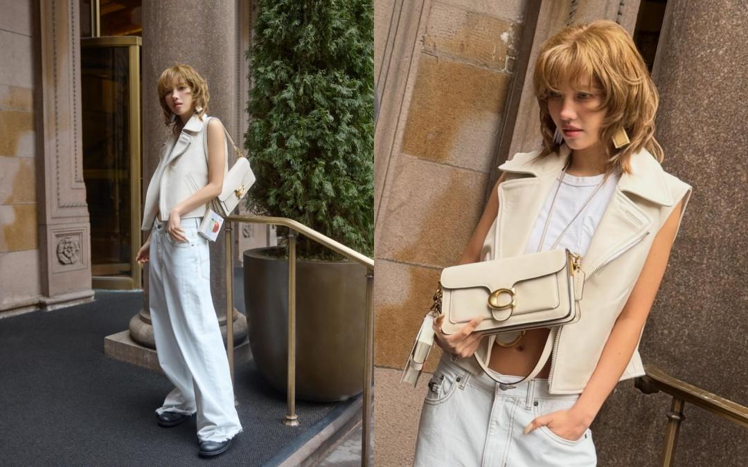 小娟這套白色皮革背心造型，中空露出傲人「A4腰」。