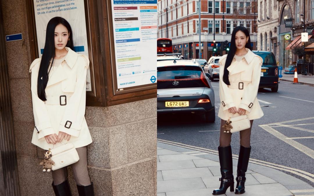 Lily以白色風衣搭配緊身褲與黑色長靴，勾勒率性俐落風格。