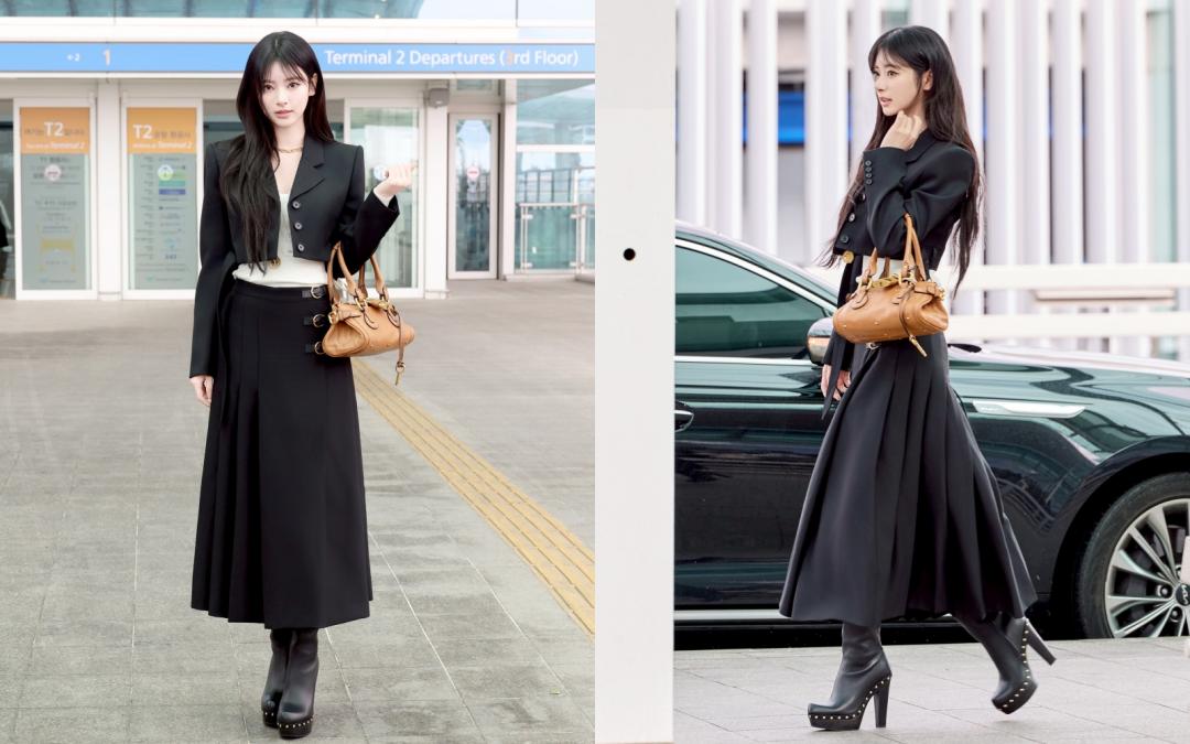Anna的機場時尚造型以黑色裙裝穿出甜美與個性。