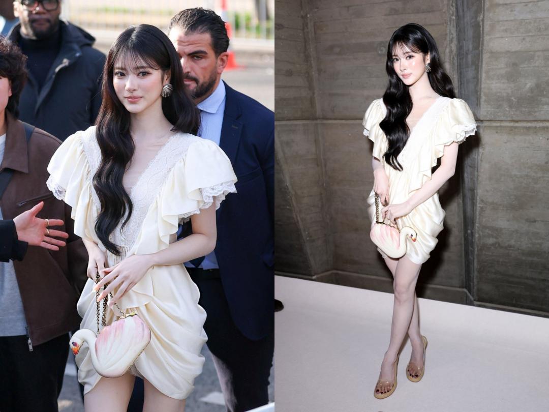 上身以錯視深V剪裁吸睛，下身裙襬若隱若現透出蕾絲短褲，每一步都在撩人。