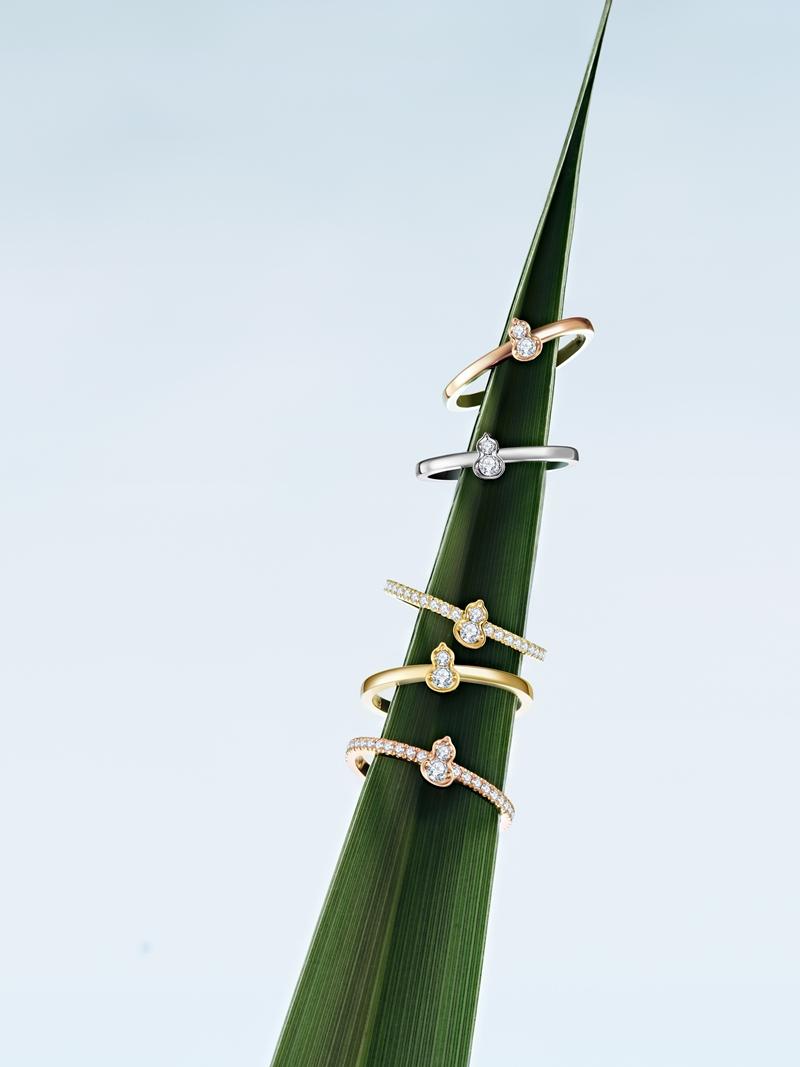 Qeelin「Wulu Mini Solitaire」系列戒指，18K白金與黃金款式，雙鑽葫蘆造型成為視覺焦點。（Qeelin提供）