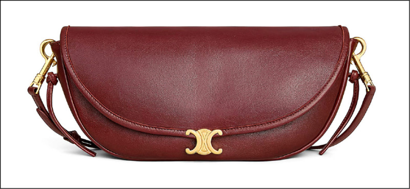 Celine全新主打包款Little Halfmoon Soft Triomphe柔軟亮澤羊皮革小型手袋，流露法式慵懶鬆弛感，87,000元。