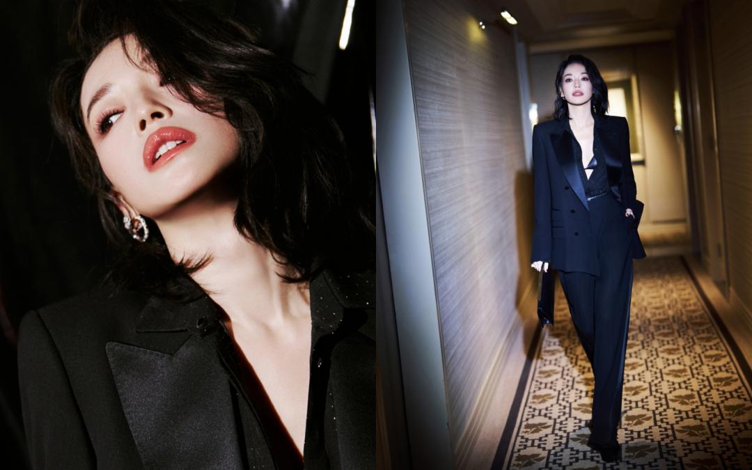 舒淇這套正裝在西裝領片上以緞面材質營造視覺層次，她又巧妙在胸前創造留白空間，延伸視覺效果更顯纖瘦修長。