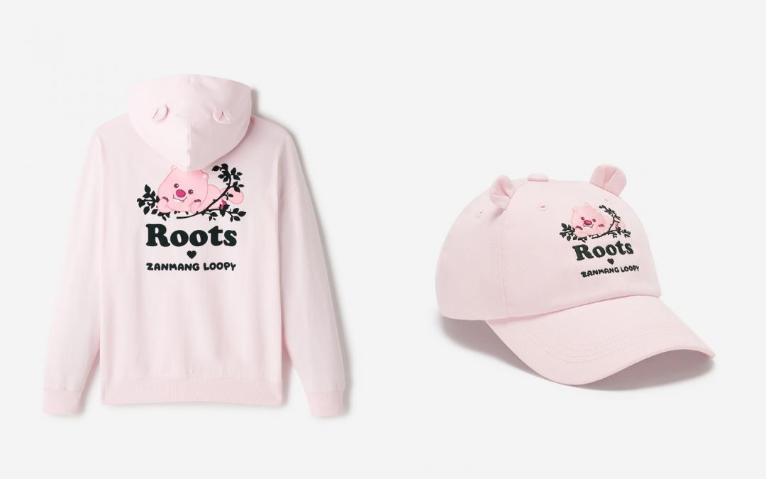 （左起）中性版粉色連帽外套（NT$4,280）、萌耳粉色棒球帽（NT$1,380）。 