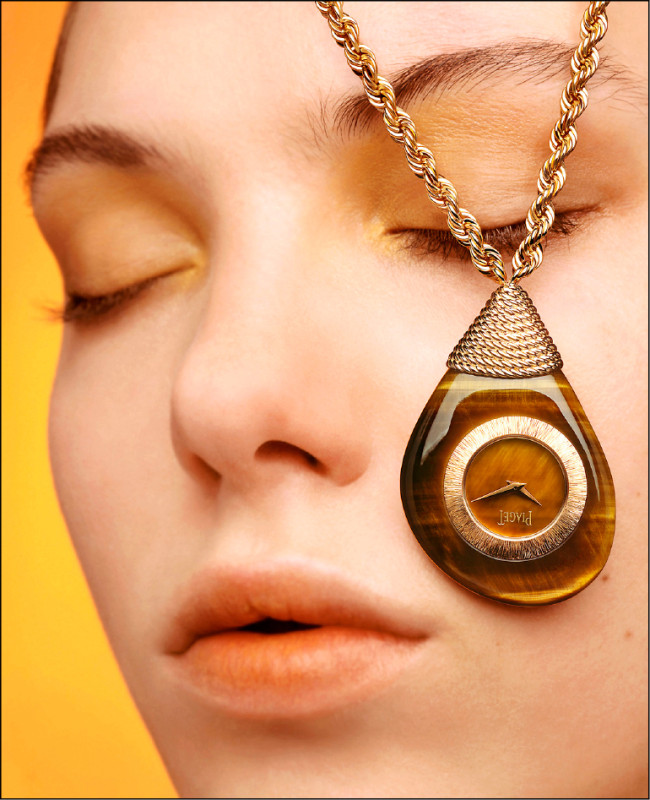 PIAGET Swinging Pebbles系列18K黃金虎眼石墜錶，搭載355P石英機芯，價格店洽。