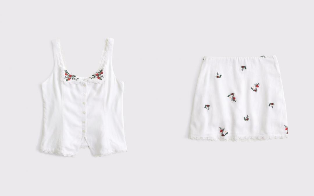 女裝（左起）亞麻混紡波浪滾邊草莓刺繡排釦背心（NT$3,390）、亞麻混紡刺繡花朵圖案迷你褲裙（NT$3,190）。