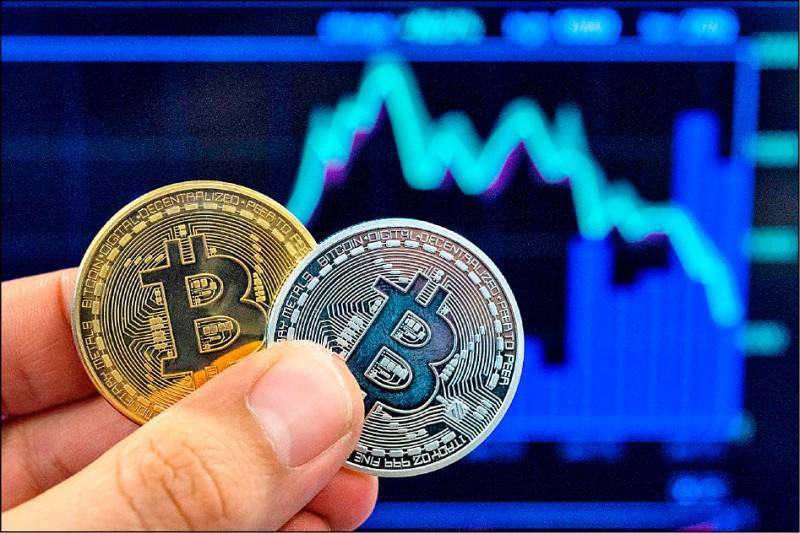 CBDC就是數位化現金，它脫離銀行帳戶的束縛，無須身分認證，甚至在離線狀態就可實現價值轉移。（AFP）