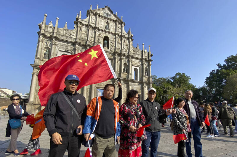 台灣駐澳門辦事處一名外交部派駐官員日前結束派任返台，接任人員欲前往澳門，遭澳方要求須先簽一中承諾書，才要發給簽證。（美聯社）